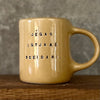 Yellow ceramic mug with quote by Vergil