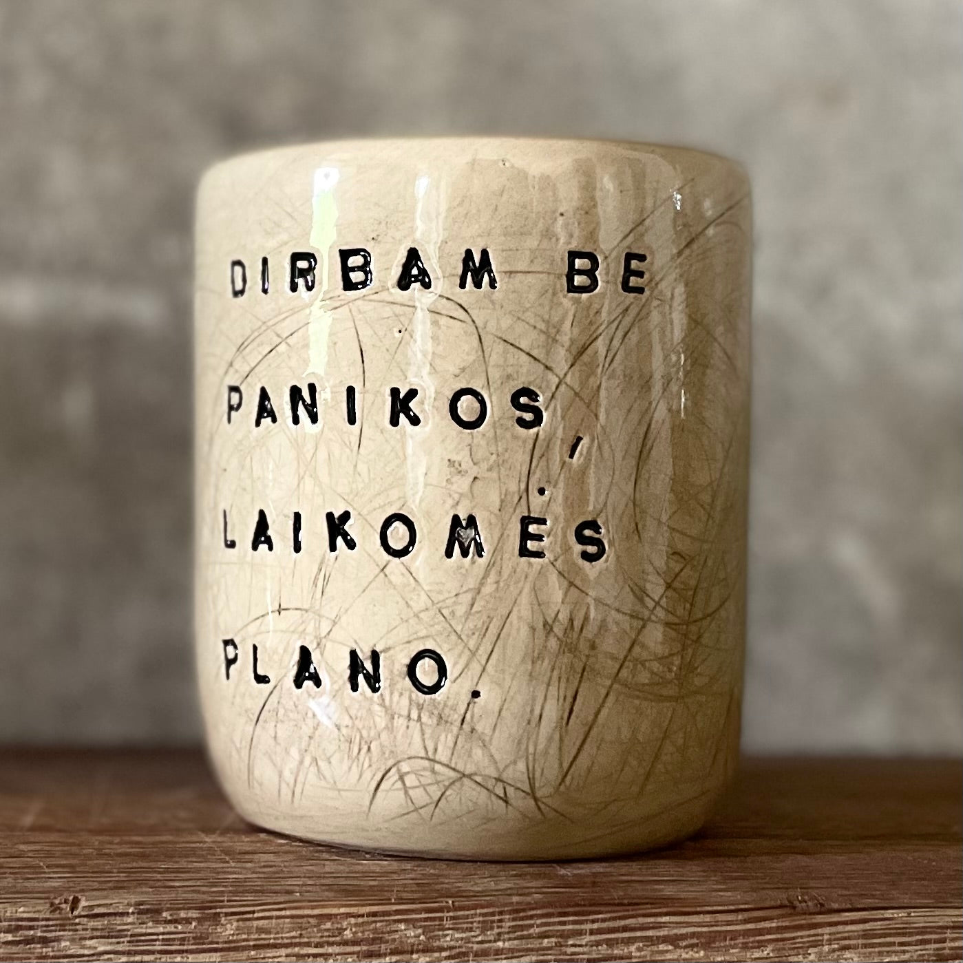 Beige tumbler mug with saying about work