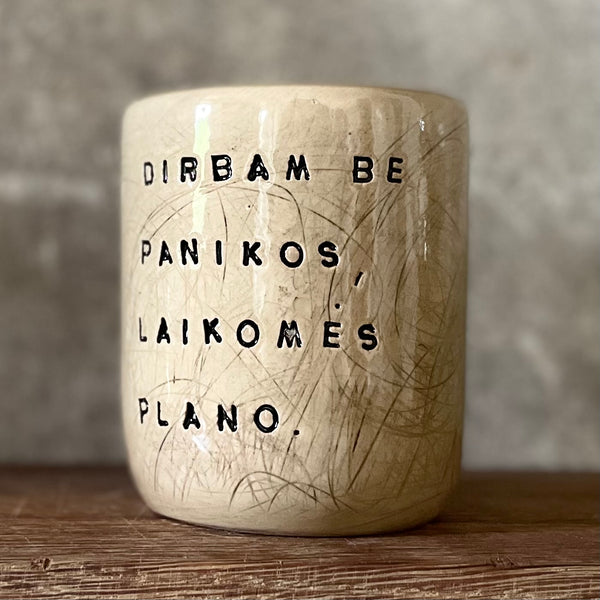 Beige tumbler mug with saying about work