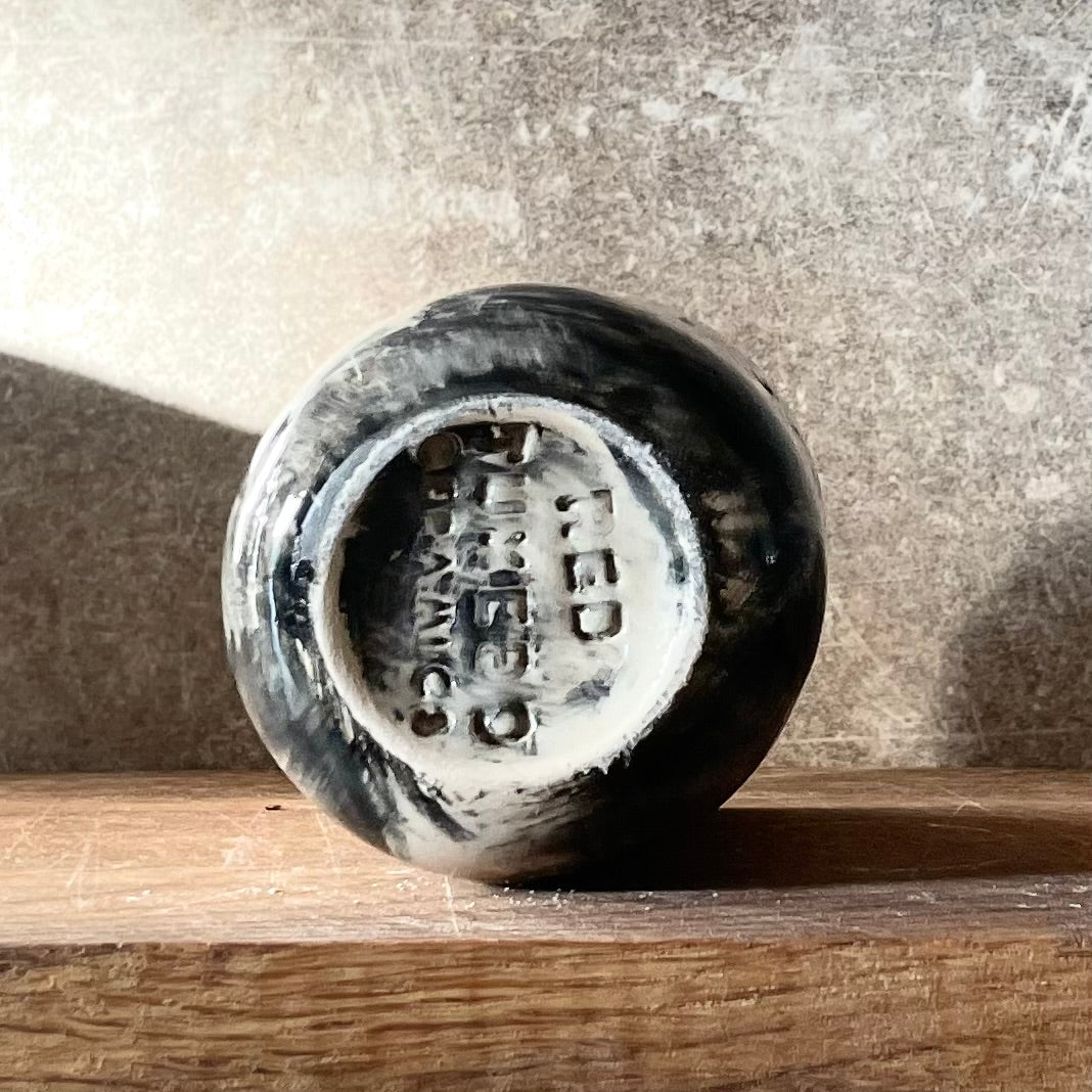 Small dark mug about discipline