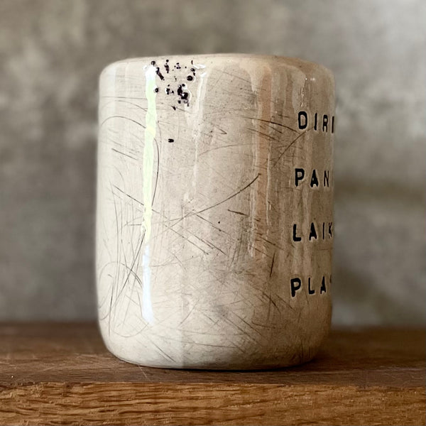 Speckled mug with words about work - another