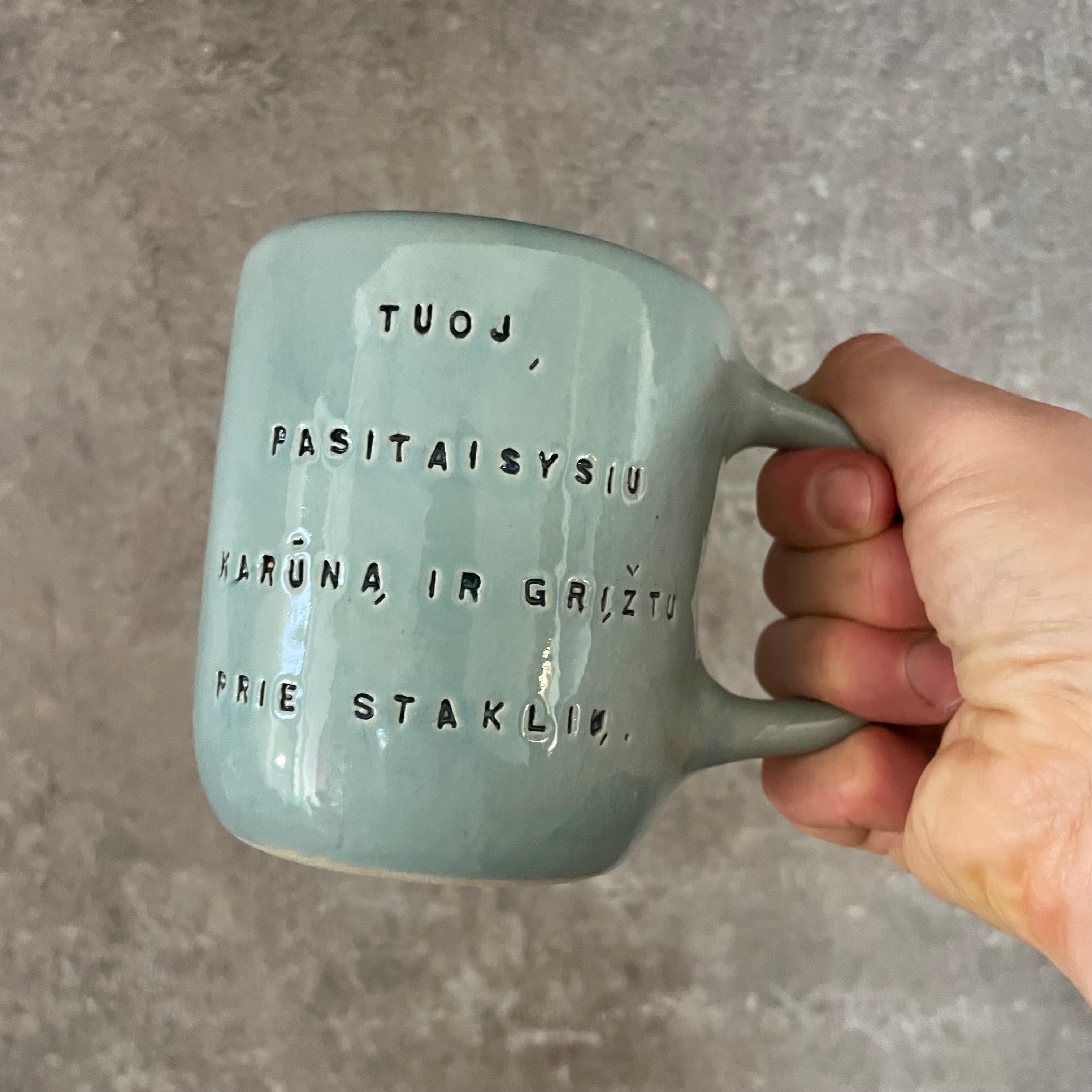 Blue mug with funny phrase in Lithuanian