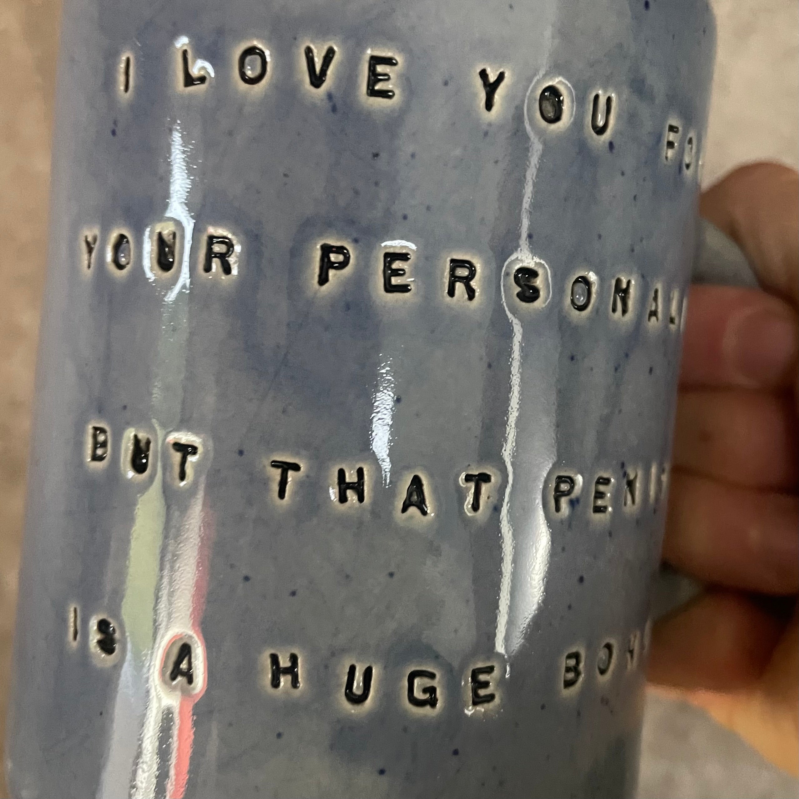 Handmade blue ceramic mug with funny text