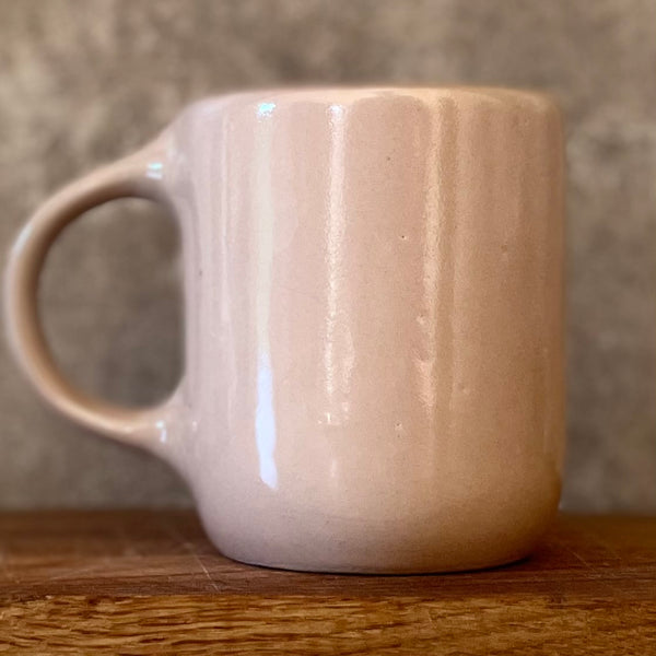 Pink big mug with saying in Lithuanian