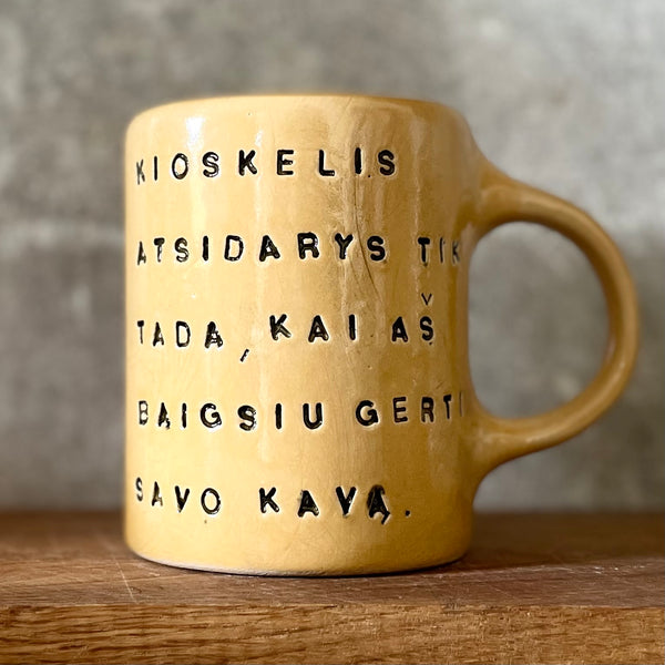 Geltonas puodelis KIOSKELIS