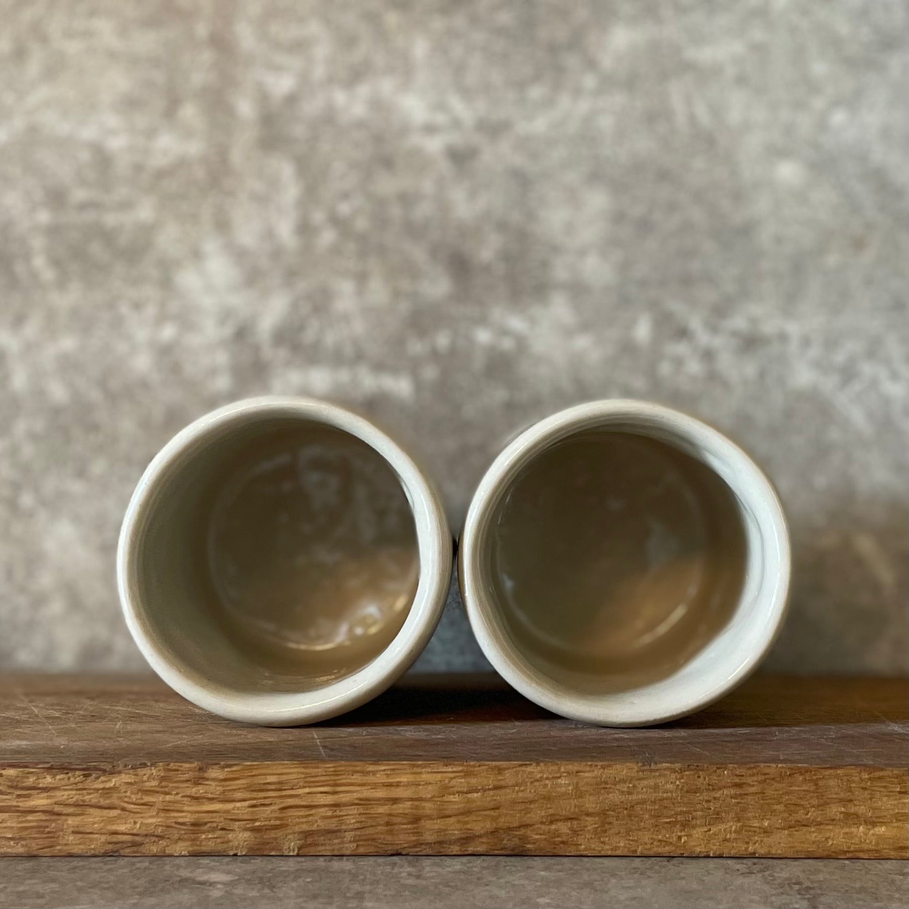Two small bad mood mugs