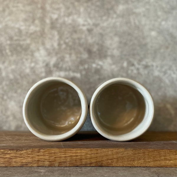 Two small bad mood mugs
