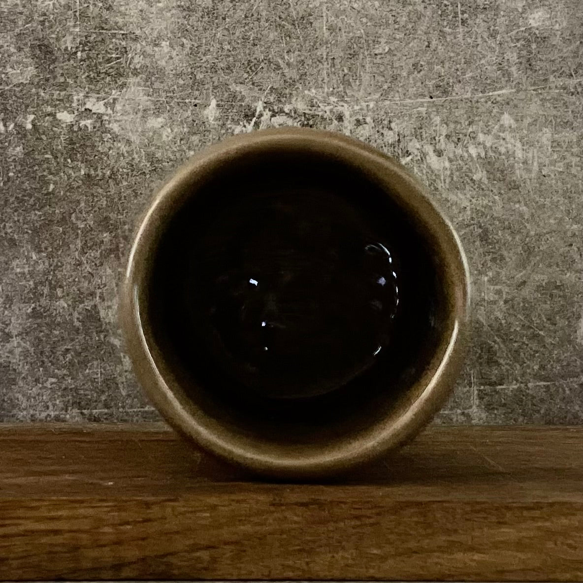 Dark brown tumbler mug with words about work