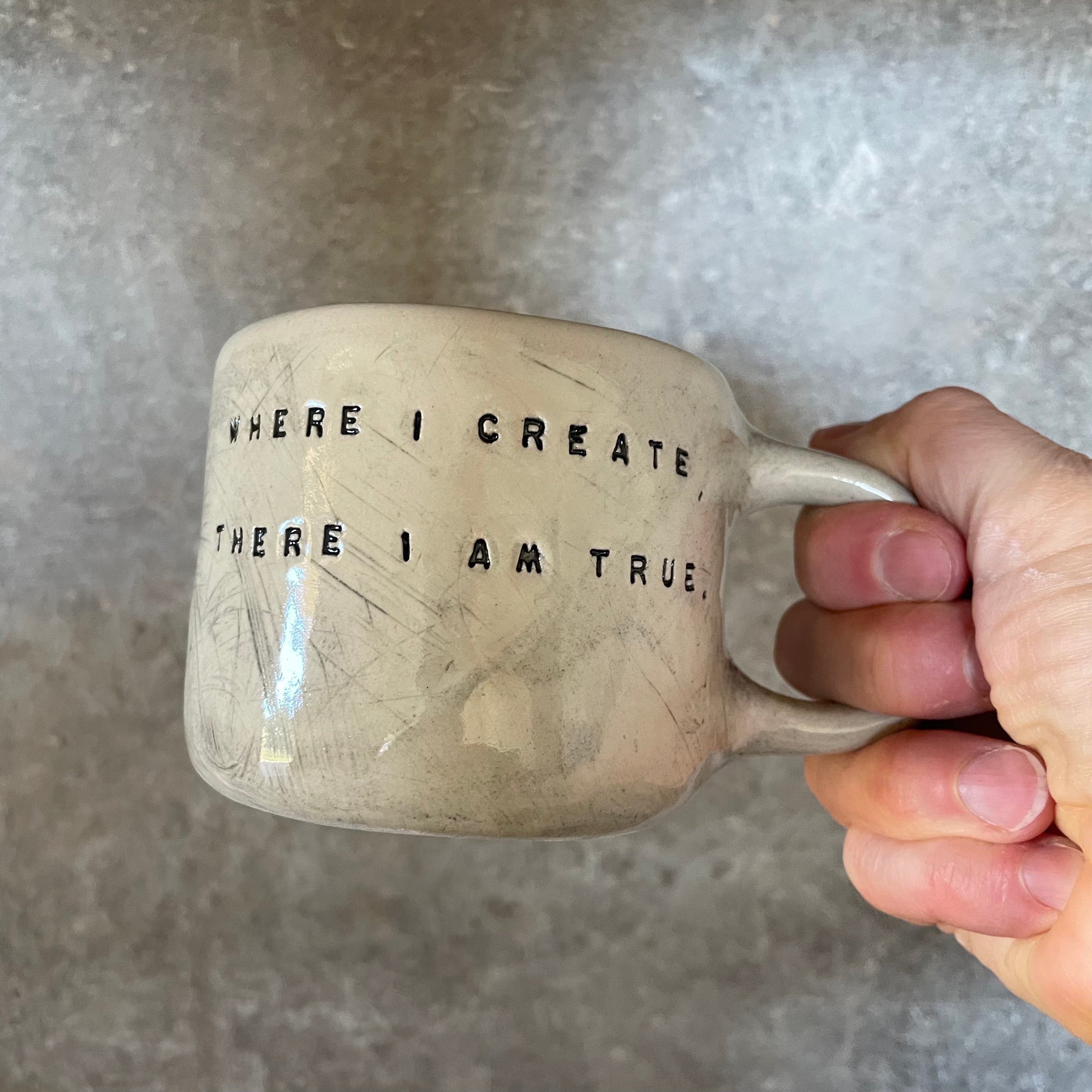 Ceramic mug with artist quote