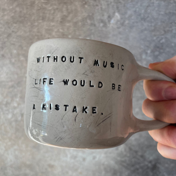 Mug with quote about music