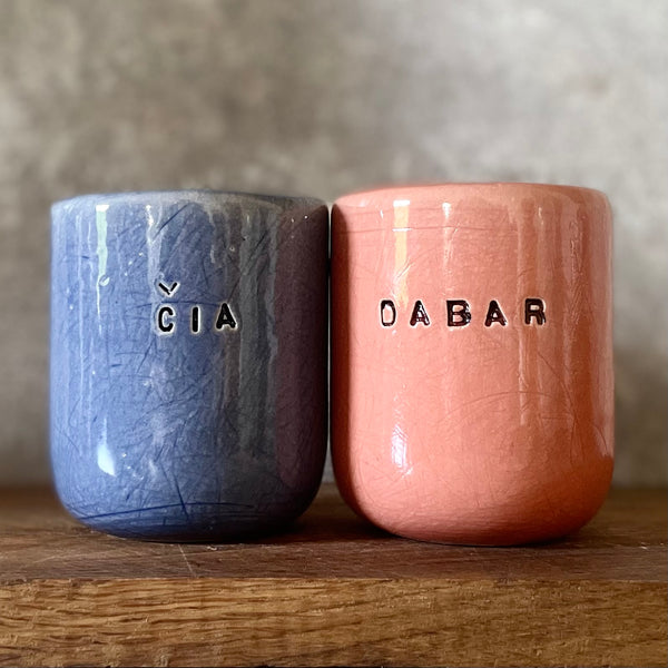 Two small mugs DABAR and CIA