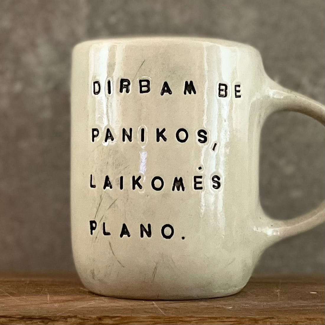 White big ceramic mug with words about work