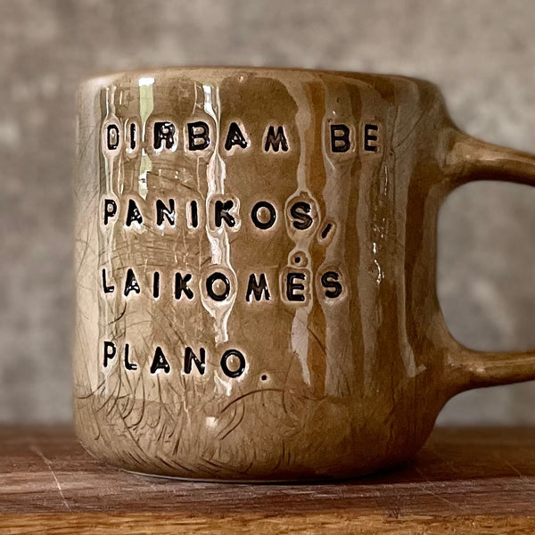 Dark brown tumbler mug with words about work
