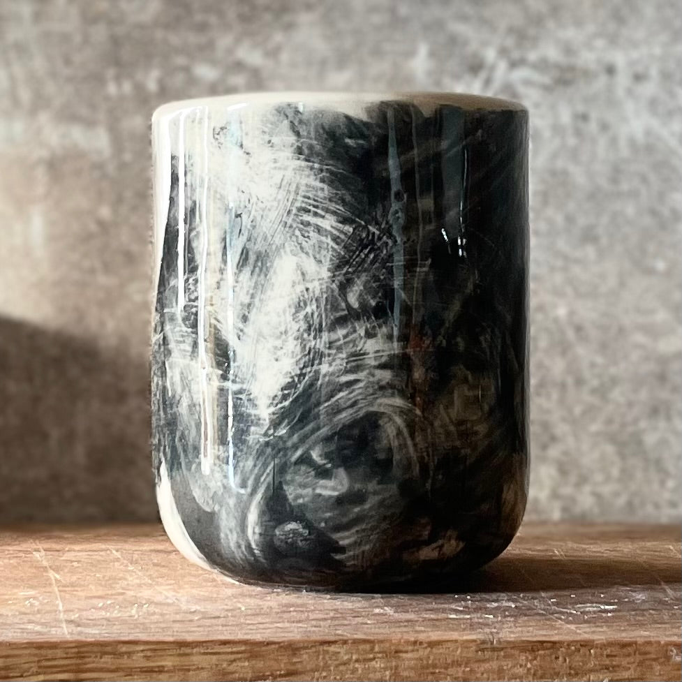 Small dark mug about discipline