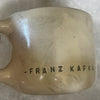 Ceramic coffee mug with quote by Kafka