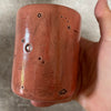 Red tumbler mug with magic saying