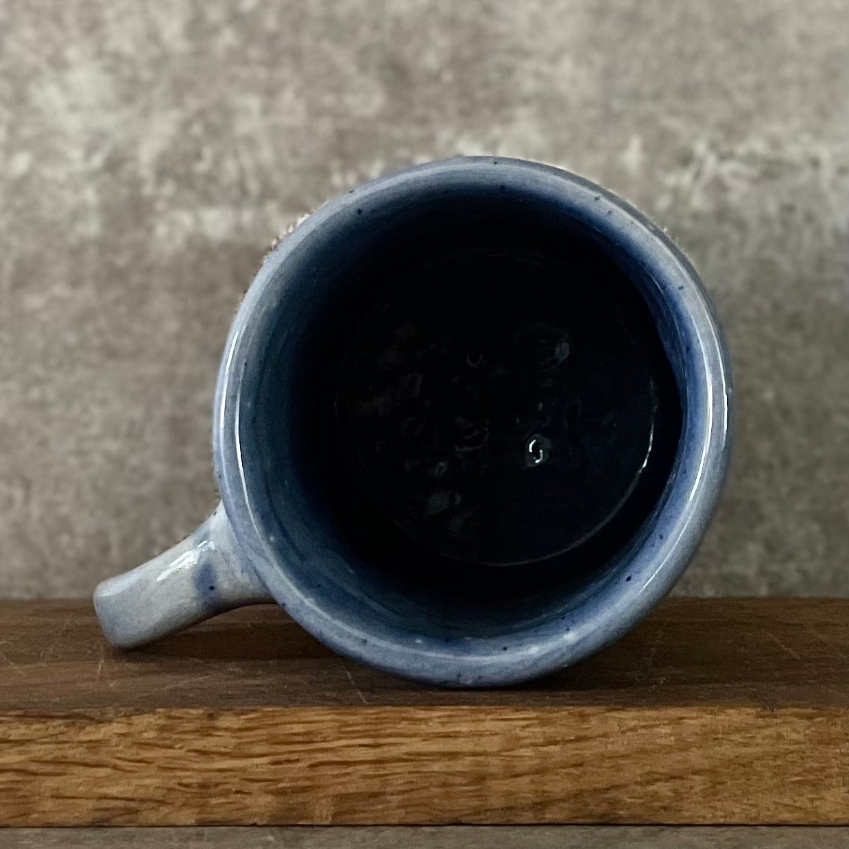Handmade blue ceramic mug with funny text