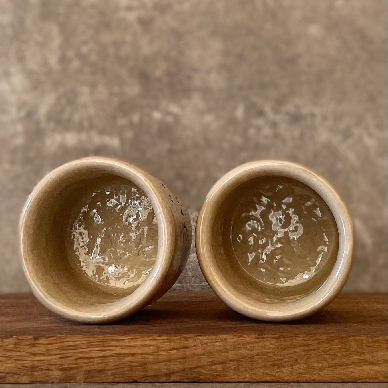 Set of two espresso mugs with words in Lithuanian