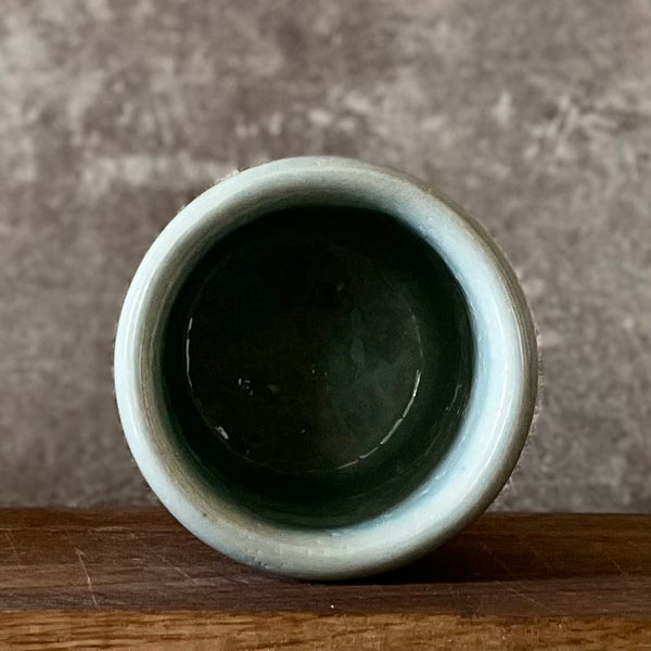 Pale blue ceramic mug "DABAR IR ČIA"