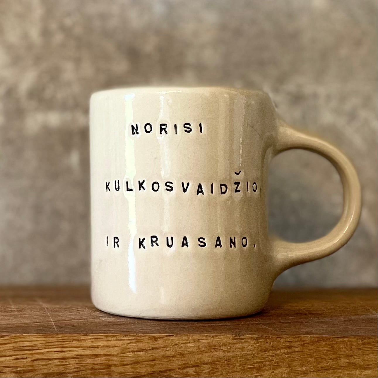 Smaller mug with funny phrase in Lithuanian