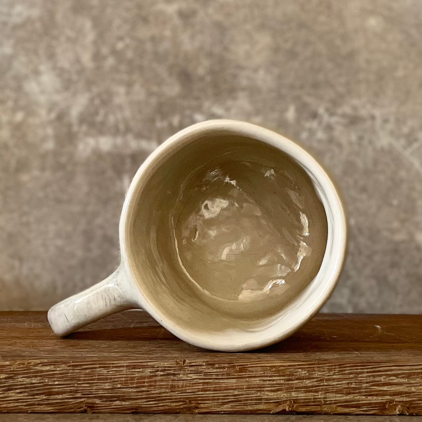 Ceramic mug with artist quote