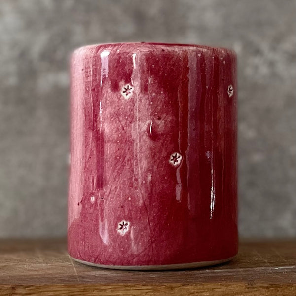 Svaiginančiai nuraudęs puodelis