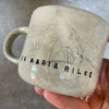 Ceramic mug with artist quote