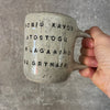 Speckled coffee mug with funny saying in Lithuanian