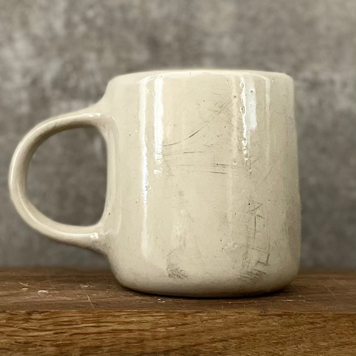 White medium ceramic mug with words about work - twin