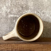 Brownish mug with funny saying