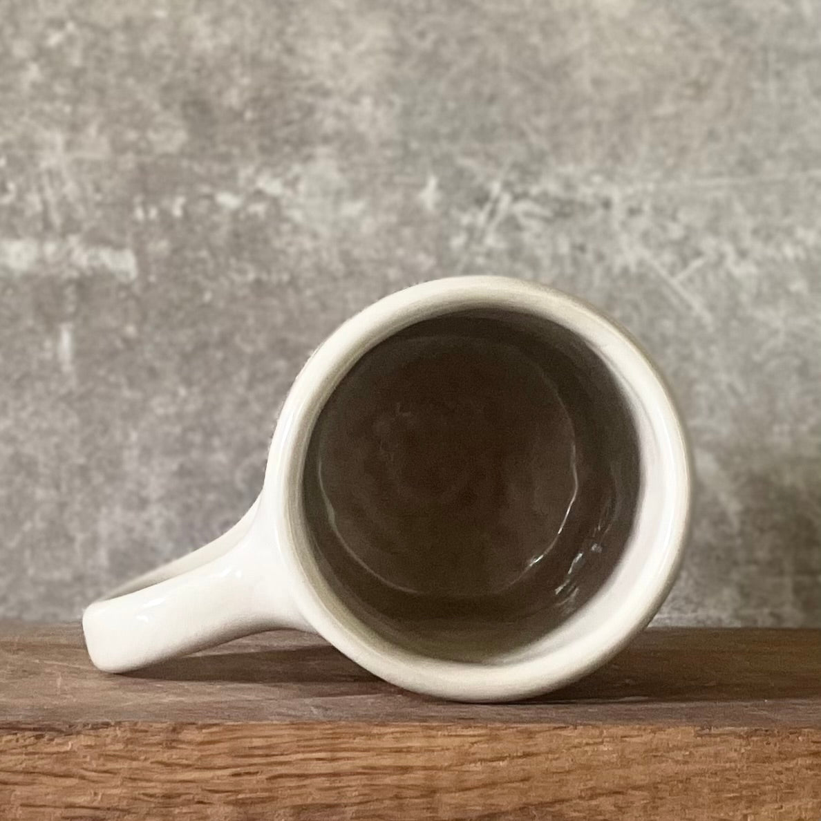 Smaller mug with funny phrase in Lithuanian