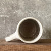 Smaller mug with funny phrase in Lithuanian