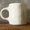 Big white ceramic mug about rest