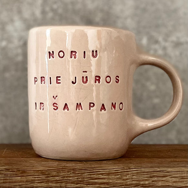 Rausvas puodelis ŠAMPANO