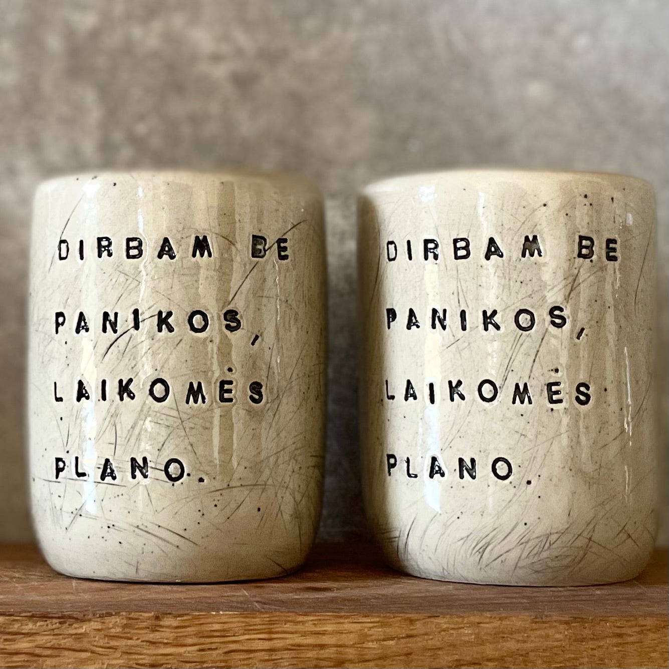 Two big ceramic tumbler mugs without handle about work
