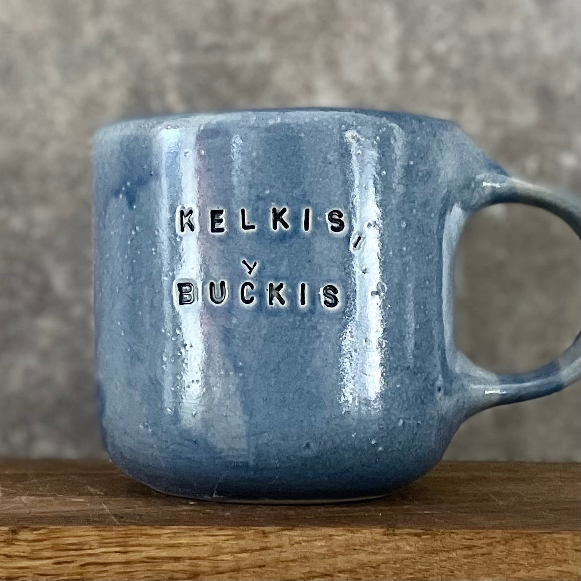 Big blue mug with saying in Lithuanian