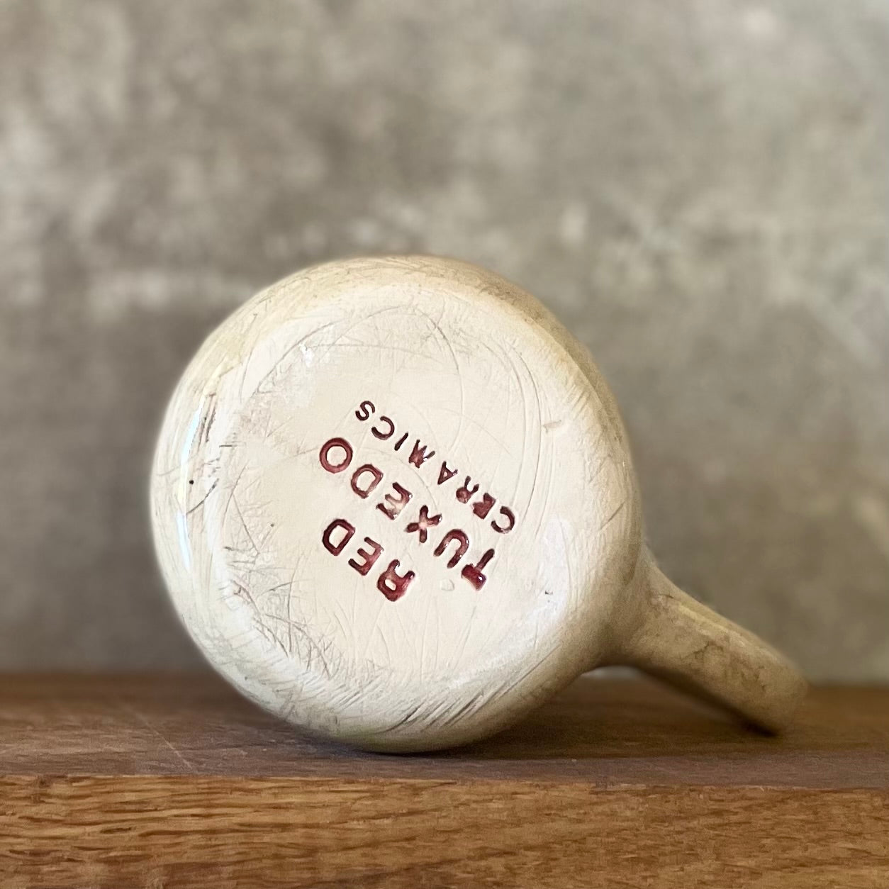 Ceramic mug with words about work