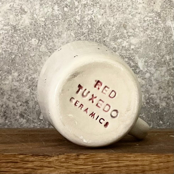 Small mug with magic words and little stars