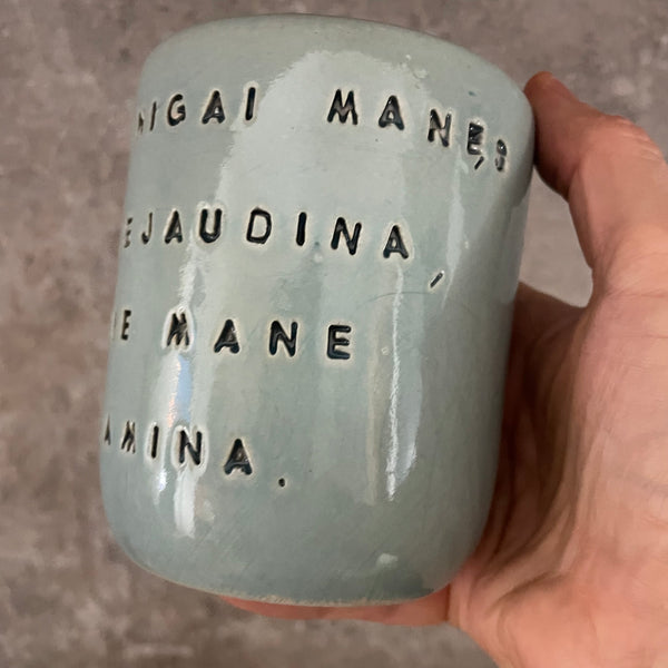 Ceramic mug about money