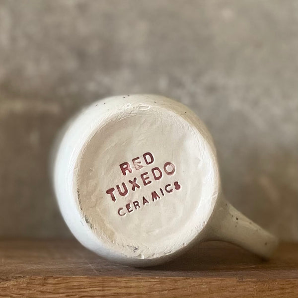 Taškuotas puodelis ŠAMPANO