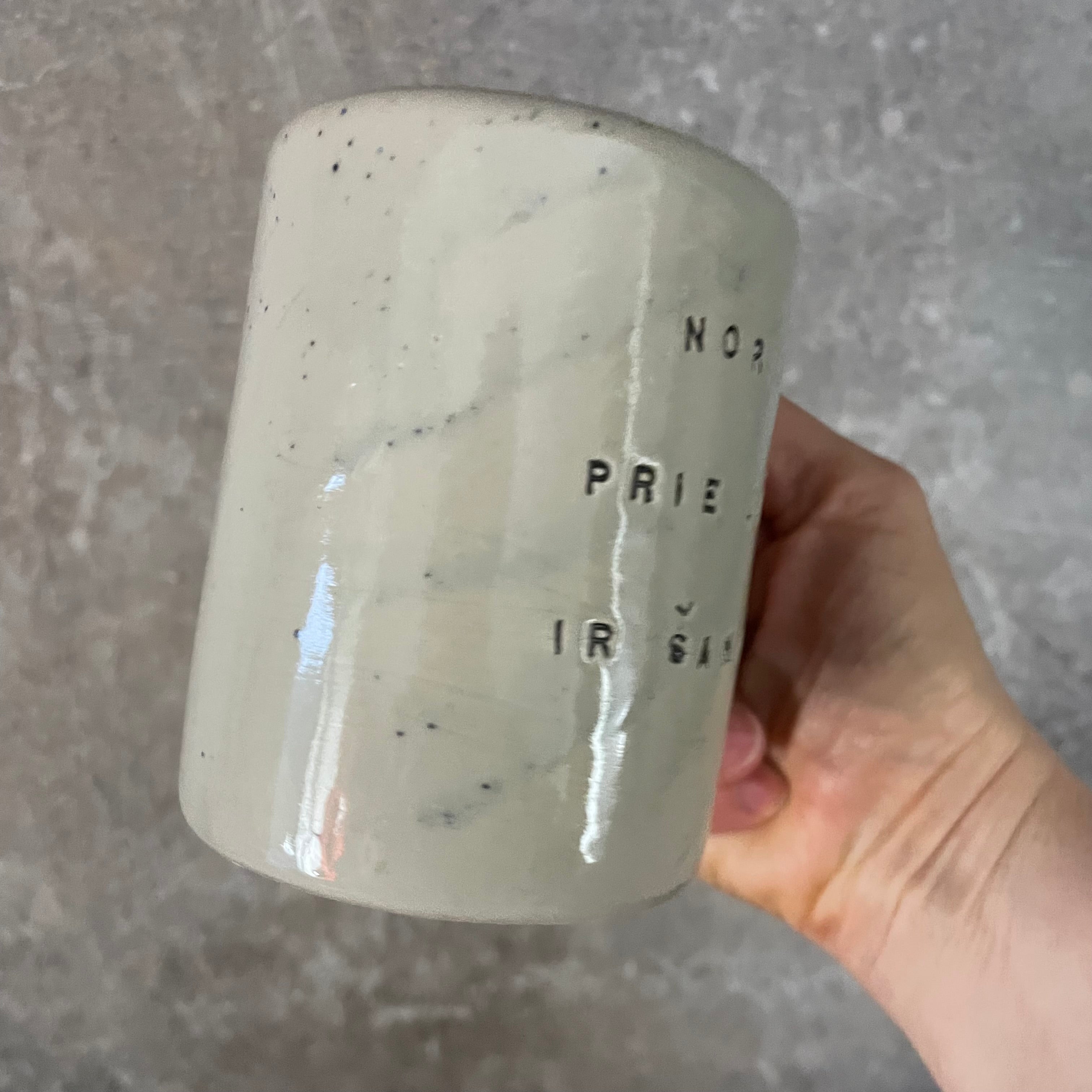 Speckled mug about champagne and the sea