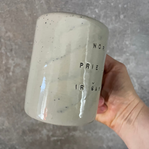 Speckled mug about champagne and the sea