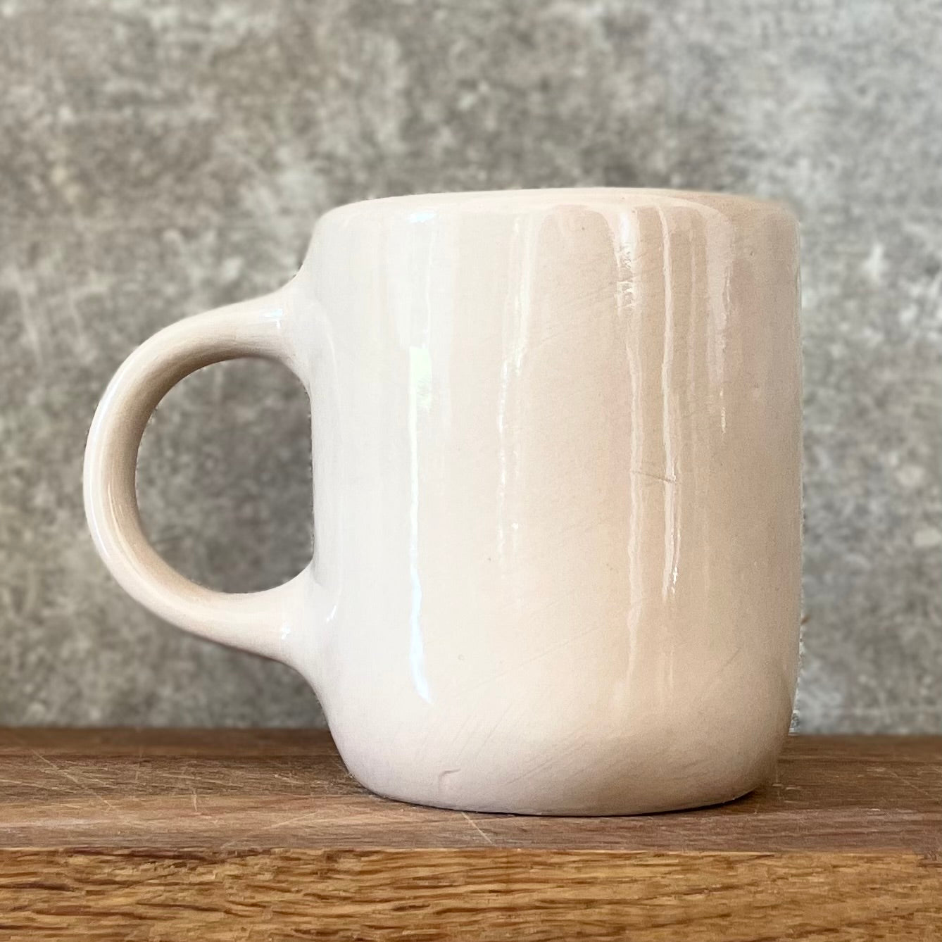Pink mug with saying in Lithuanian