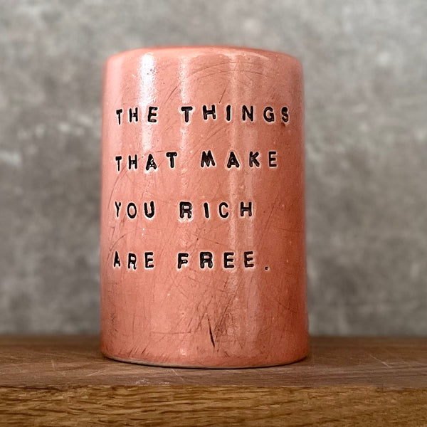 Red mug with inspirational saying