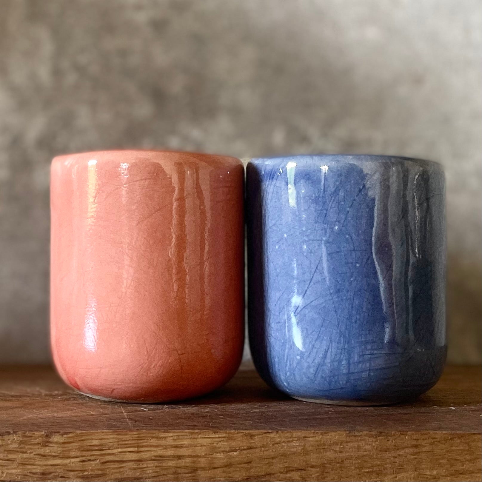 Two small mugs DABAR and CIA