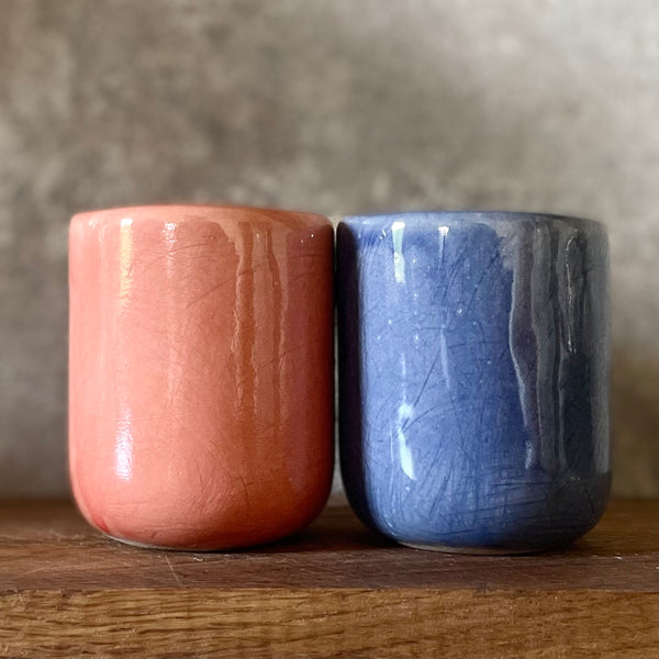 Two small mugs DABAR and CIA