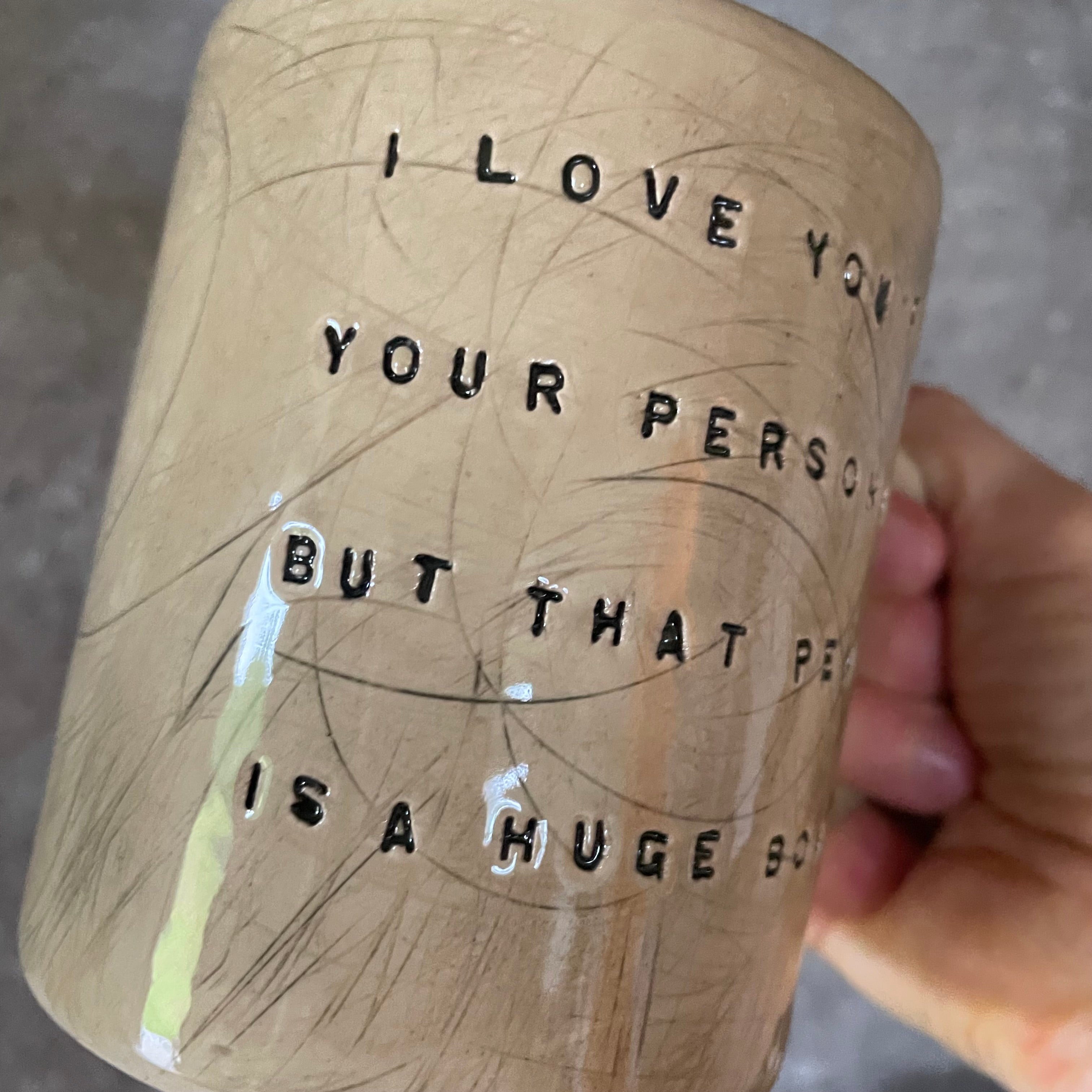 Brownish mug with funny saying