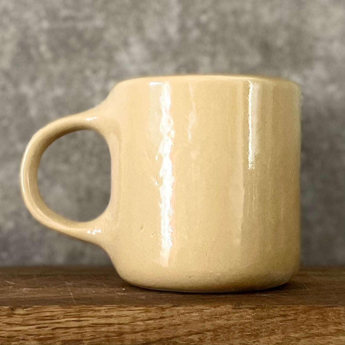 Yellow ceramic mug about luck