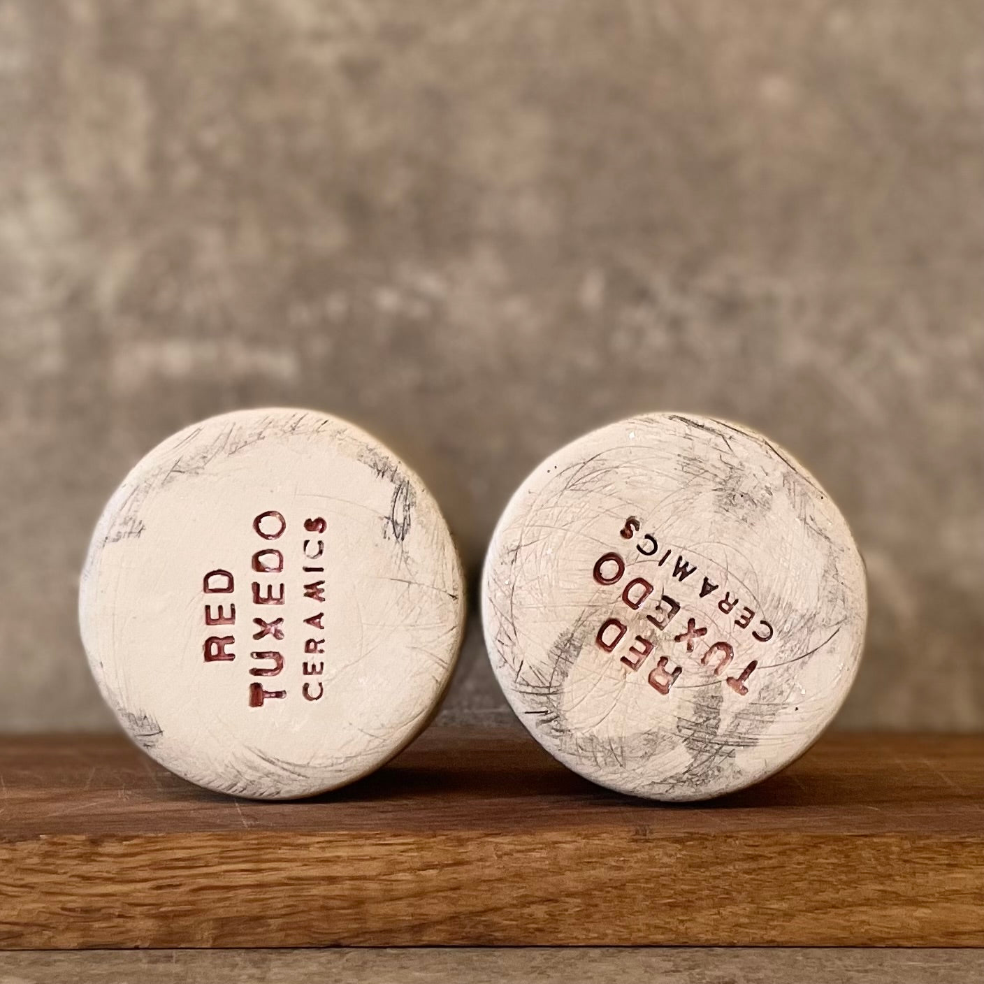 Set of two espresso mugs with words in Lithuanian