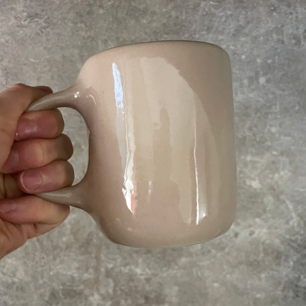 Pink big mug with saying in Lithuanian